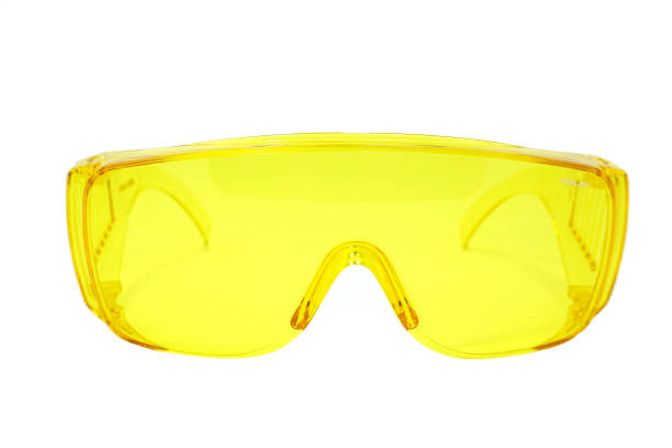 istock Yellow protection safety glasses isolated on white background 1268996034