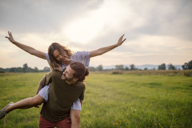 istock Love couple on a meadow 1268997701