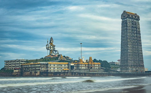 murdeshwar temple early morning view from low angle image is taken at murudeshwar karnataka india at early morning. it is the house of one of the tallest rajagopuram in the world.