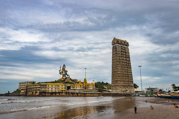murdeshwar temple early morning view from a unique angle image is taken at murudeshwar karnataka india at early morning. it is the house of one of the tallest rajagopuram in the world.