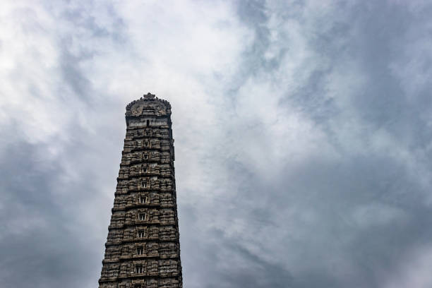 murdeshwar temple rajagopuram entrance with flat sky image is take at murdeshwar karnataka india at early morning. it is one of the tallest gopuram or temple entrance gate in the world.