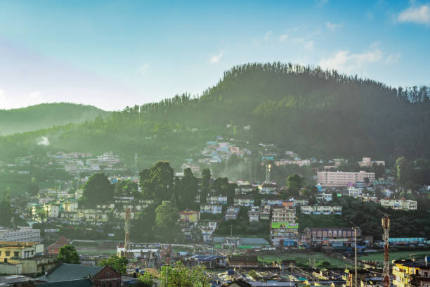 istock city view with mountain and bright blue sky from hill top at dawn 1269010609