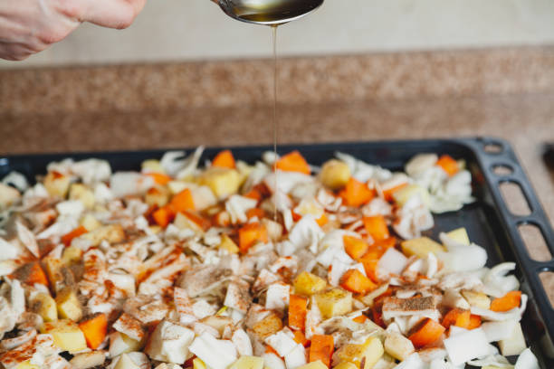istock Hand pours vegetable oil from tablespoon 1269017767