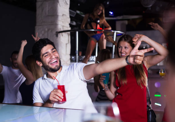 istock People joying in nightclub 1269018132