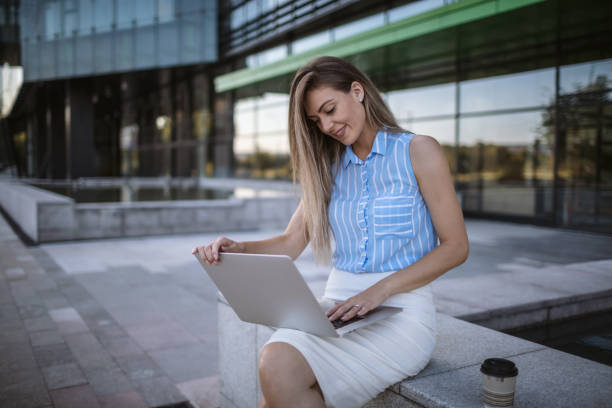 istock Happy business woman using computer and working 1269018157