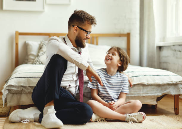 istock Cheerful father and daughter resting at home 1269018965