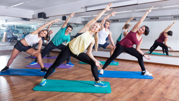 istock Happy adults having group fitness class 1269029308