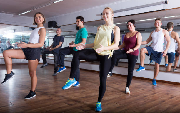 istock Dancers learning  zumba elements in gymnastics hall 1269029316