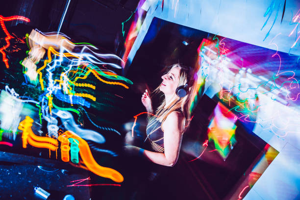 istock Smiling Young Woman DJ Performing 1269030051