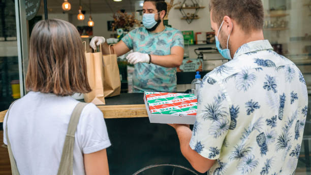 istock Couple picking up take away food order 1269033134