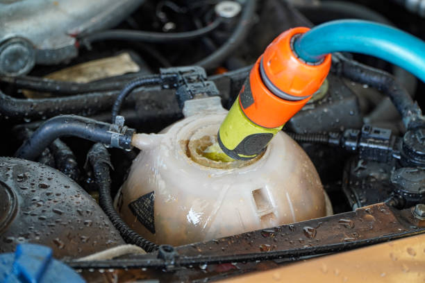 istock Add water to the car radiator is boiling. 1269033419