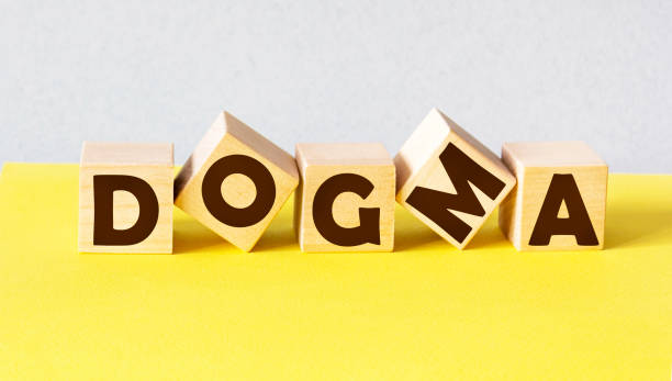 istock Word DOGMA made from building blocks isolated on light background 1269036356