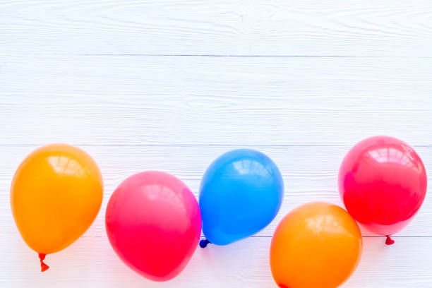 istock Flat lay with ballons - party concept - on white background top-down copy space 1269037234
