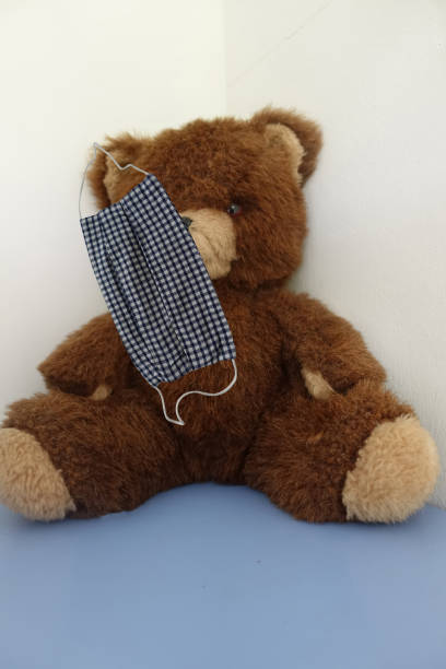 istock Coronavirus protective mask with a teddy bear   Sheet mask 1269037454