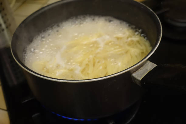 istock Cooking Spaghetti in a Pot of Boiling Water 1269037610