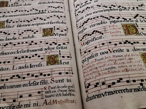 Pages of an ancient musical book written by hand by scribe monks in the south of Italy