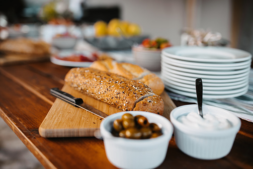 Party Buffet with bread and olives, selective focus