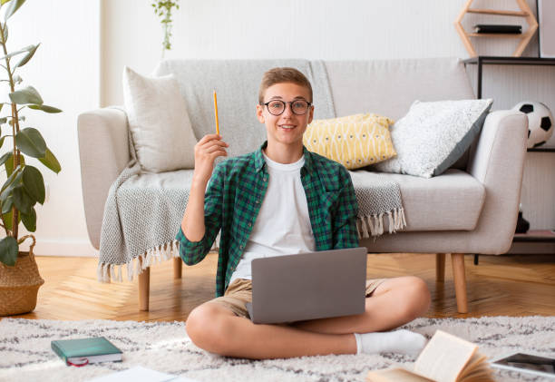istock Inspired teenager found solution, doing homework online 1269042354