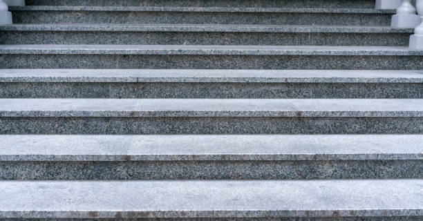 istock empty stone staircase with large steps to doorway 1269044042