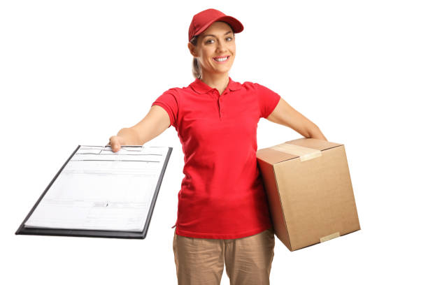 istock Female delivery worker with a box and a document 1269052278