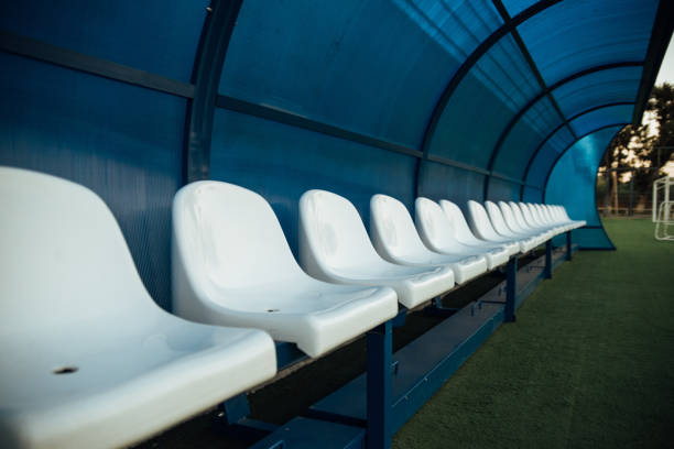 Coach and reserve benches in a soccer field.Soccer bench seats