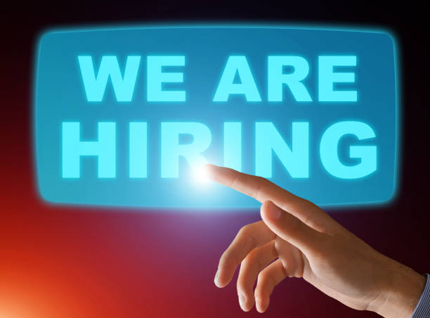 istock Collage with businessman pushing WE ARE HIRING button on transparent screen, gradient background 1269064033