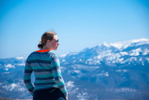 istock Woman on mountain slope 1269079841