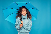Girl with blue umbrella
