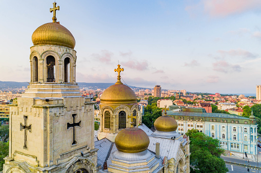 Aerial drone view of The Cathedral of the Assumption in Varna, Bulgaria - (Bulgarian: Катедралата Успение Богородично във Варна, България) The picture was taken with DJI Phantom 4 Pro drone / quadcopter. The Dormition of the Mother of God Cathedral is the largest and most famous Bulgarian Orthodox cathedral in the Bulgarian Black Sea port city of Varna, and the Cathedral of the Assumption of God the second largest in Bulgaria (after the Alexander Nevski Cathedral in Sofia). Officially opened on August 30, 1886. It is the residence of the bishopric of Varna and Preslav and one of the symbols of Varna.