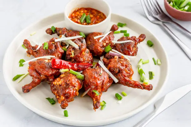 Popular Indo-Chinese Chicken Dish Made with Chicken Winglets Horizontal Photo