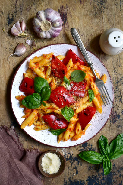 istock Penne pasta with tomato sauce and grilled bell pepper 1269099451