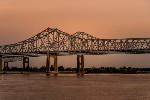 Crescent City Connection Bridge over the Mississippi River at dusk, New Orleans Louisiana.