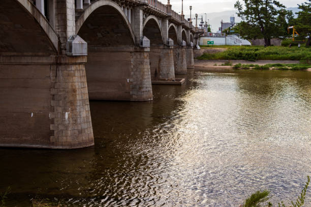 istock Concrete bridge and calm river 1269103967