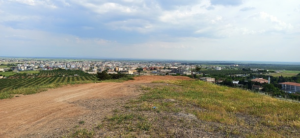 Drone point of view of TV tower in Dobrich, Bulgaria, agricultural fields, blue sky and cloudscape. The scene is situated in Dobrich, Bulgaria and is taken with DJI qudracopter Mavic IIIDrone point of view of TV tower in Dobrich, Bulgaria, agricultural fields, blue sky and cloudscape  (Bulgarian:Телевизионната кула, град Добрич, България).The scene is situated in Dobrich, Bulgaria and is taken with DJI qudracopter Mavic IIIDrone point of view of TV tower in Dobrich, Bulgaria, agricultural fields, blue sky and cloudscape  (Bulgarian:Телевизионната кула, град Добрич, България).The scene is situated in Dobrich, Bulgaria and is taken with DJI qudracopter Mavic III