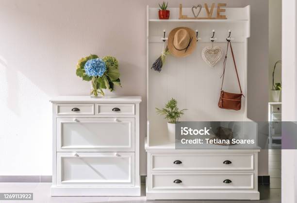 Home Interior White Wooden Furniture At Entryway Small Foyer Organisation Decision Stock Photo - Download Image Now