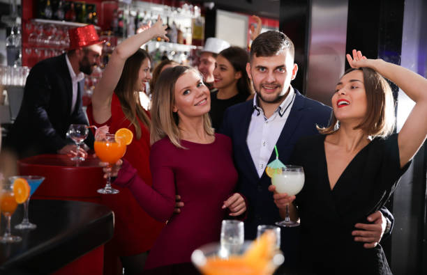 istock Man with female friends  in bar 1269117322