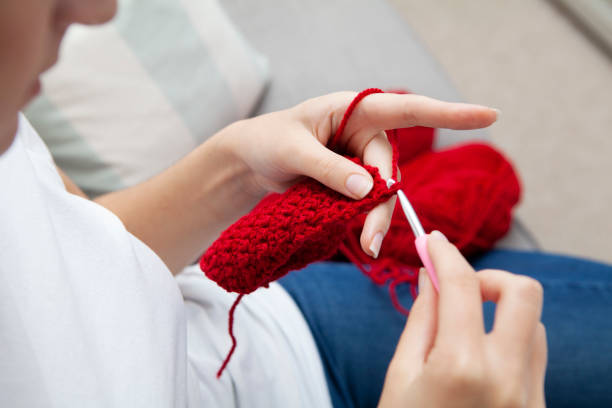 istock Close-up of hands doing crochet 1269118247