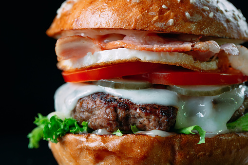 Juicy beef Burger on a black background