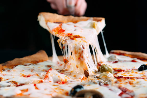 istock Pizza with very much cheese melting. 1269122793