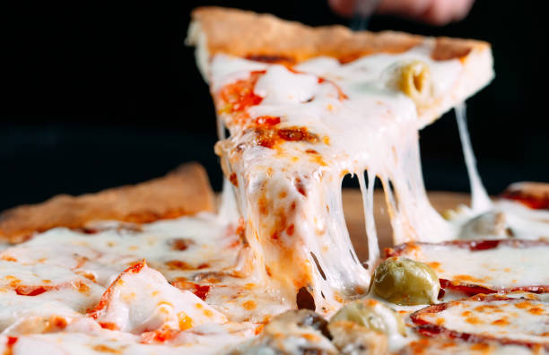 istock Pizza with very much cheese melting. 1269122808