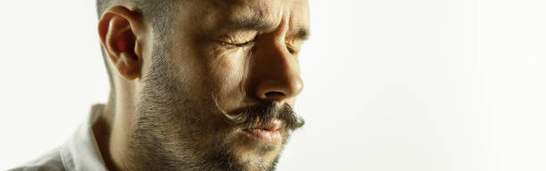 istock Caucasian young man's close up cropped shot on studio background, flyer 1269125615