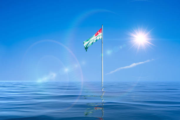 paisaje marino con asta de bandera y bandera abjasia - abkhazian flag fotografías e imágenes de stock