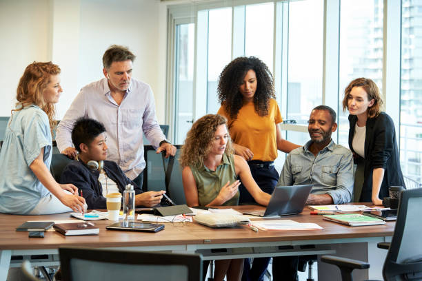 istock Business people working on laptop in office 1269127330