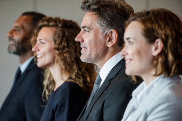 istock Business people at board meeting 1269128168