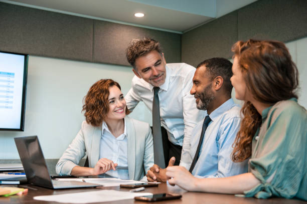 istock Business people discussing in conference room 1269128212