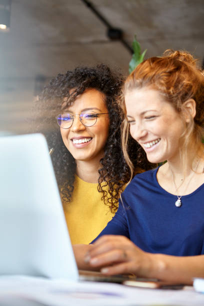 istock Businesswomen working in office 1269128527