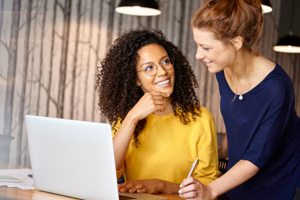 istock Businesswomen working in office 1269128528