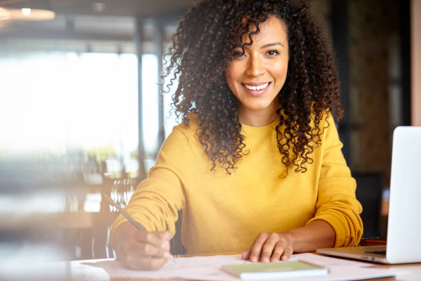 istock Businesswoman working in office 1269128529