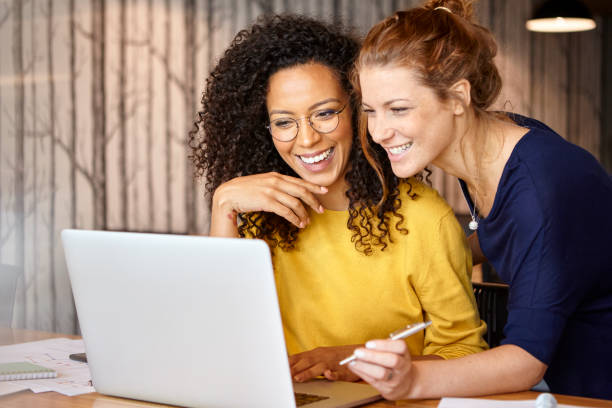 istock Businesswomen working in office 1269128551