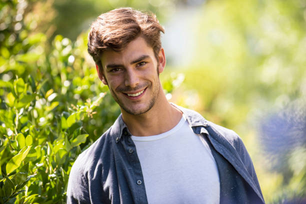 istock Young man in garden 1269131186